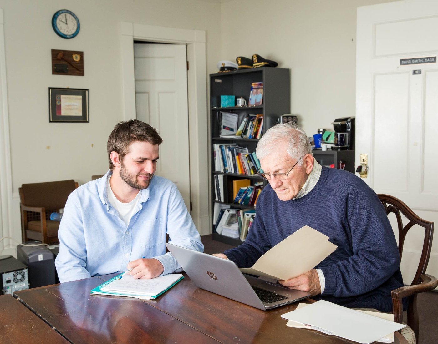 student working with professor