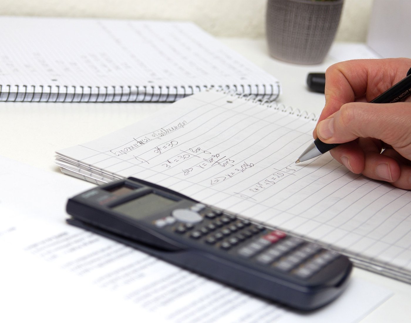 math problem being solved and calculator