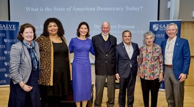 Group photo of Putnam, Armstrong and others in Salve's Bazarsky Lecture Hall