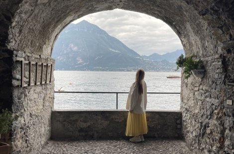 View out of a stone arch in Varenna, Italy over Lake Como 