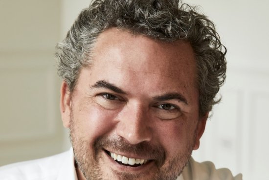 Professional headshot of Cody Keenan