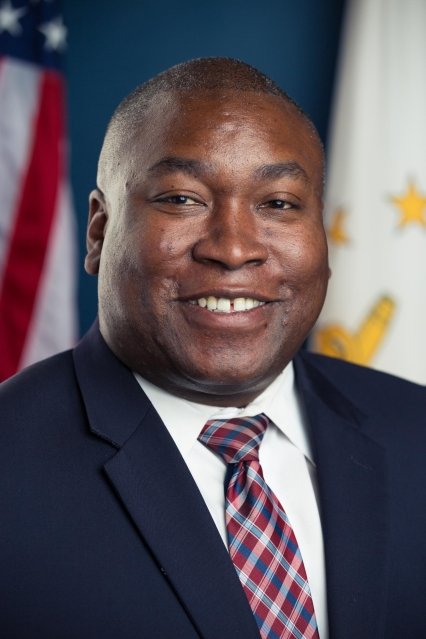 Professional headshot of Kasim Yarn